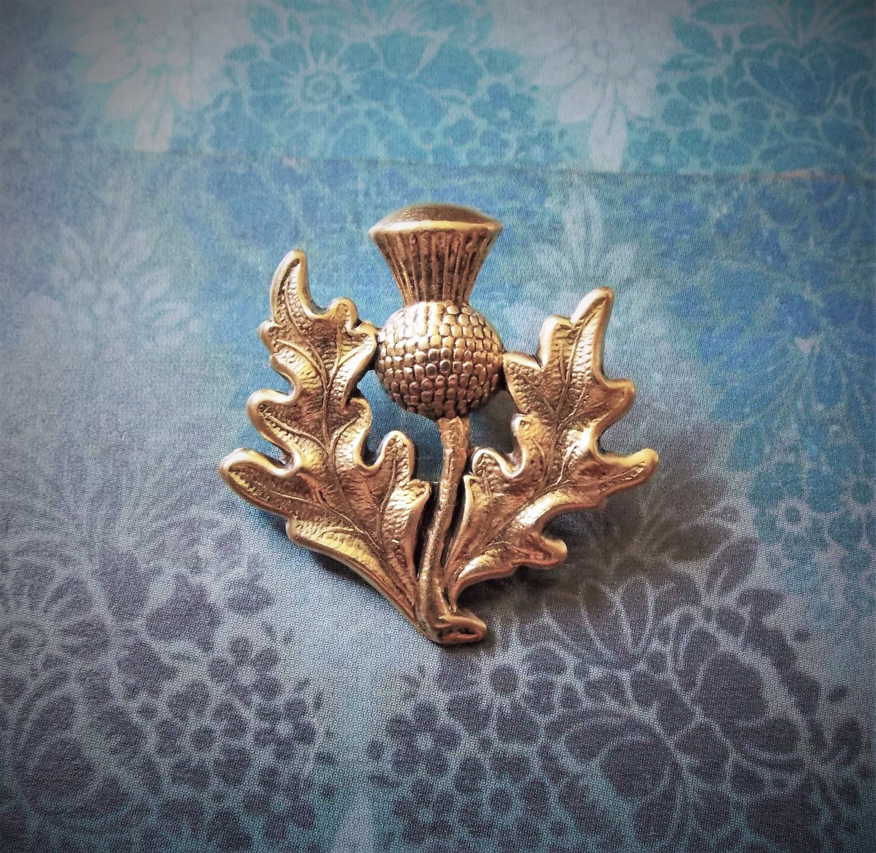 Brooch on waistcoat best sale