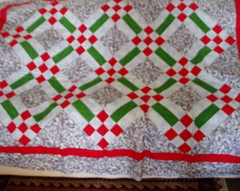 Handmade Quilt Top/Christmas Colors with the center squares with Holly and Berries