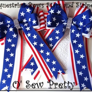 May include: Three red, white, and blue star-shaped hair bows with a white background. The bows are made of ribbon with a star pattern and a red, white, and blue stripe pattern. The bows are tied with a white ribbon and have a rhinestone embellishment in the center. The text "O' Sew Pretty" is at the bottom of the image.