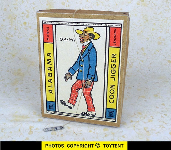 coon jigger wind up toy