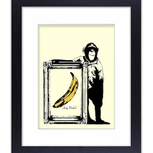 May include: A black and white illustration of a monkey holding a framed picture of a yellow banana. The picture is signed "Andy Warhol".