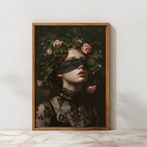 May include: A framed art print depicting a woman with a black blindfold and a floral crown of pink roses. She is wearing a black lace top. The artwork has a vintage aesthetic with a dark, moody background.