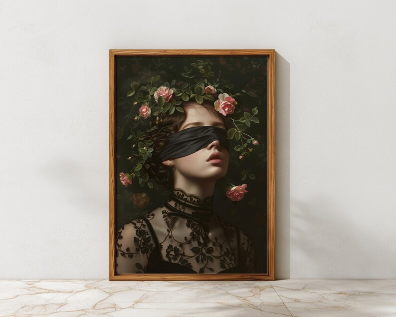 May include: A framed art print depicting a woman with a black blindfold and a floral crown of pink roses. She is wearing a black lace top. The artwork has a vintage aesthetic with a dark, moody background.