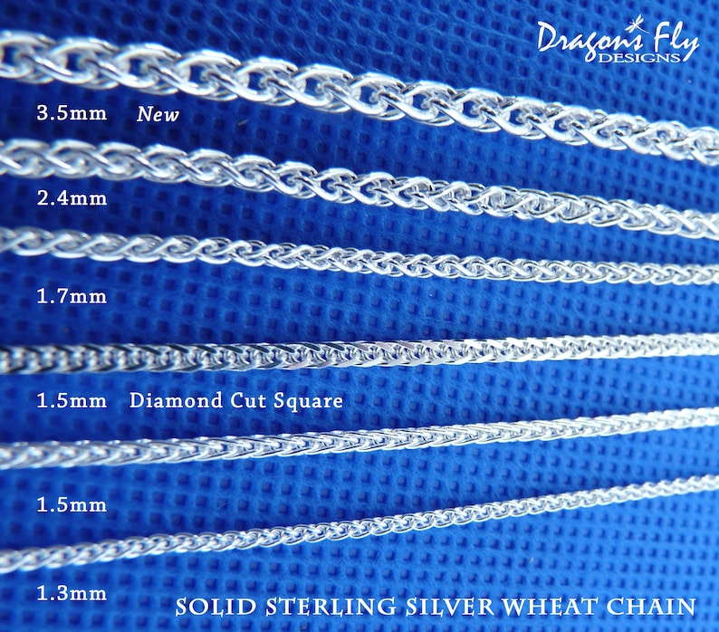 May include: A close-up of six silver wheat chains of different thicknesses, laid out horizontally on a blue background. The chains are labelled with their thickness in millimetres, ranging from 1.3mm to 3.5mm. The text "SOLID STERLING SILVER WHEAT CHAIN" is visible at the bottom of the image.