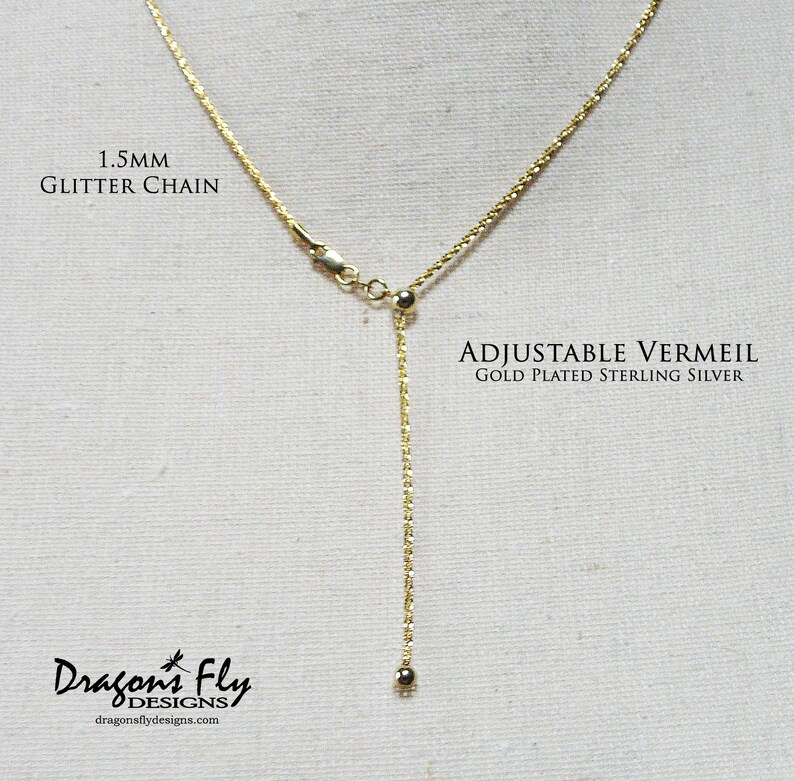 May include: An adjustable chain necklace made from gold-plated sterling silver, featuring a 1.5mm glitter chain. The chain is adjustable with a sliding bead and a lobster clasp.