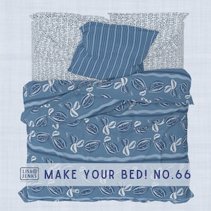 May include: A blue and white patterned bed set, including a duvet cover and two pillowcases. The duvet features a leaf design, while the pillowcases have a striped and dotted pattern. The text "MAKE YOUR BED! NO.66" is visible.