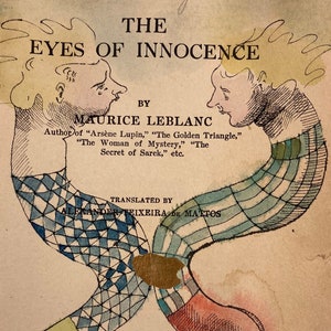 May include: A vintage book cover for "The Eyes of Innocence" by Maurice Leblanc. The illustration shows two figures with intertwined bodies, wearing patterned clothing. The title and author's name are visible, along with the publisher and the year 1920.