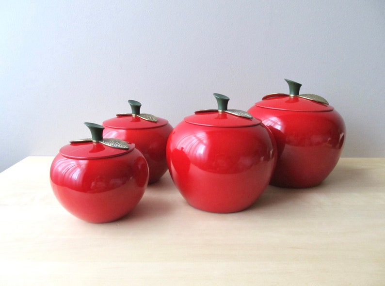 midcentury red apple canisters set of four aluminum brass leaf lids near mint condition image 1