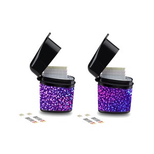 May include: Two black containers with glitter lids, each containing a stack of white test strips. The containers are decorated with a purple and pink glitter pattern.