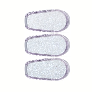 May include: Three clear, lavender-colored, oval-shaped, adhesive patches with a glittery, white surface.
