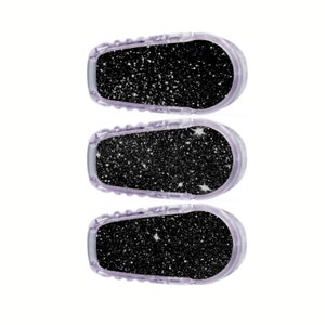 May include: Three clear plastic medical device covers with a black and white glitter design. The design resembles a starry night sky.