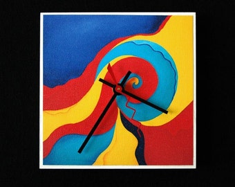 Abstract art clock with vivid reds, blues and yellows.