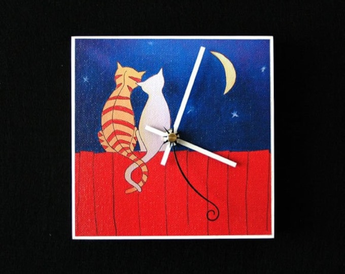 Night cats on a fence, art clock
