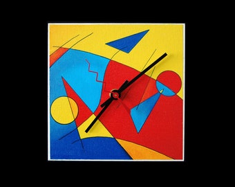 Fun, abstract art clock with intense yellows, reds and blues