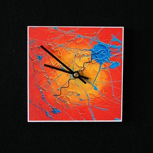 Vibrant, orange and blue, abstract art clock image 1