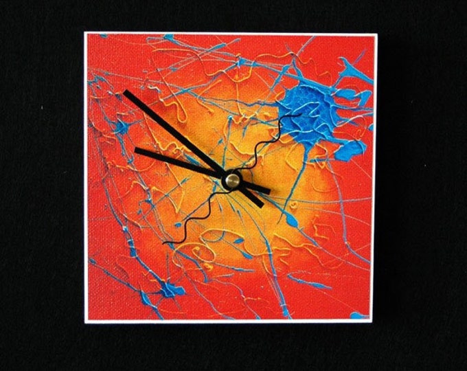 Vibrant, orange and blue, abstract art clock
