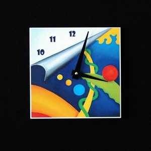 Unusual, bright colored abstract, yellow, blue, orange, red and green, art clock