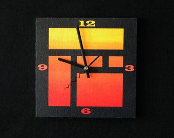 Architect inspired black and orange contemporay art clock