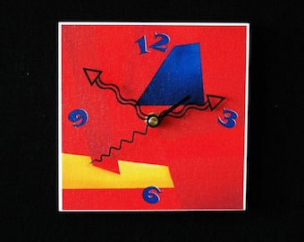 Vibrant red, yellow and blue, modern art clock