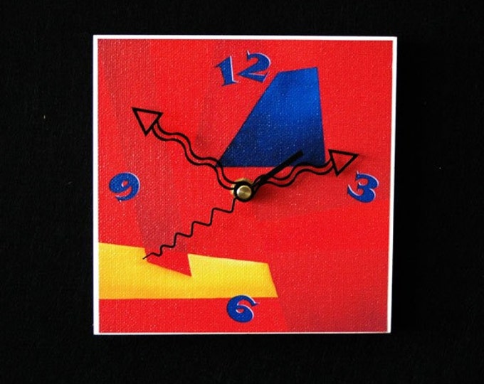 Vibrant red, yellow and blue, modern art clock
