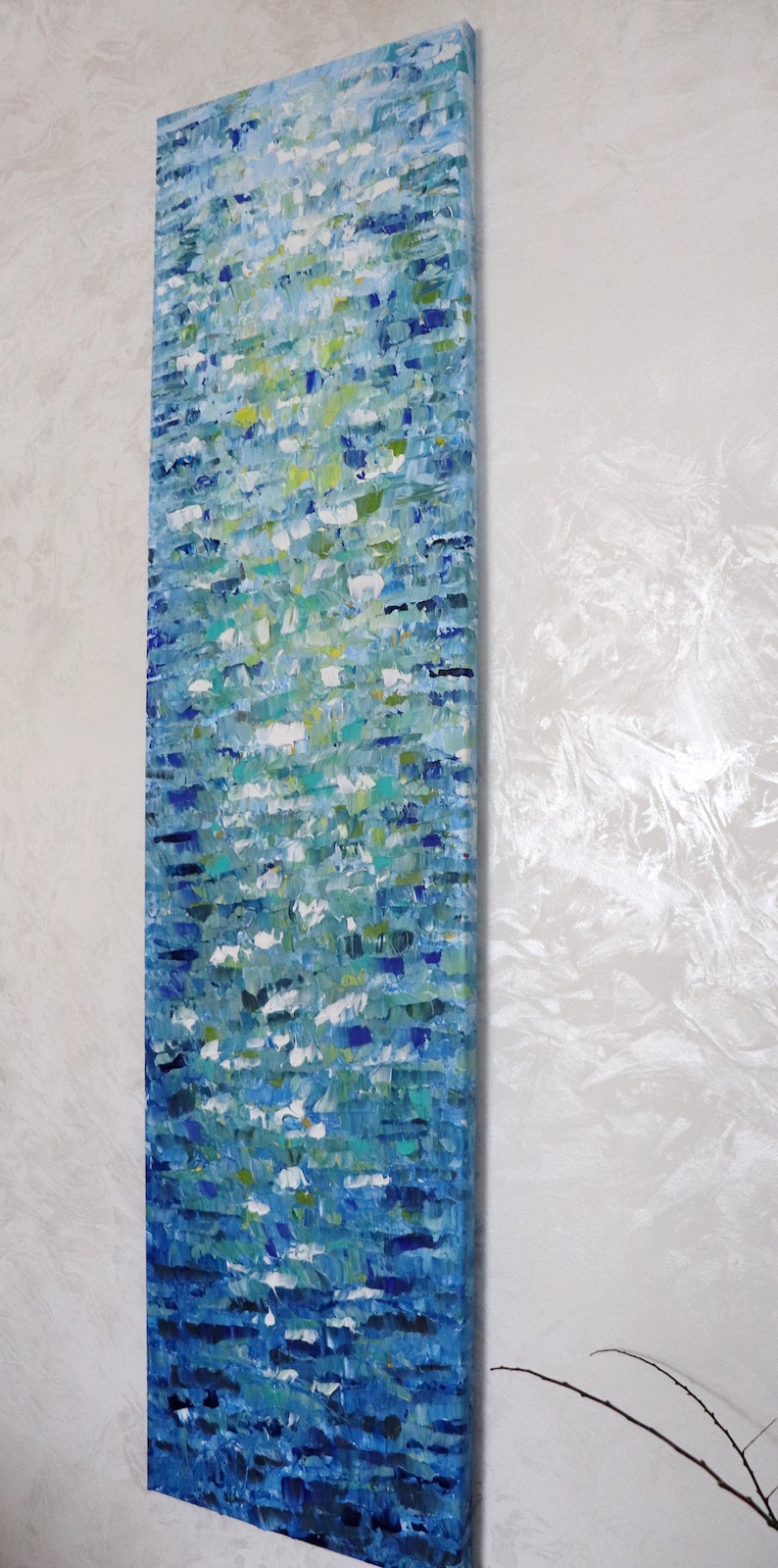 May include: Abstract painting on canvas with a blue, green, and white color scheme. The painting has a textured surface and appears to depict water.