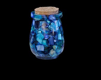 Resin and blue colored shell stash jar with cork lid