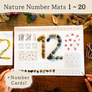 May include: A rectangular educational mat titled Nature Number Mats 1-20 featuring the number 12 formed by stones, tally marks made of twigs, a dot-to-dot puzzle, and tracing lines. A separate card shows the number 12 created with yellow flowers.