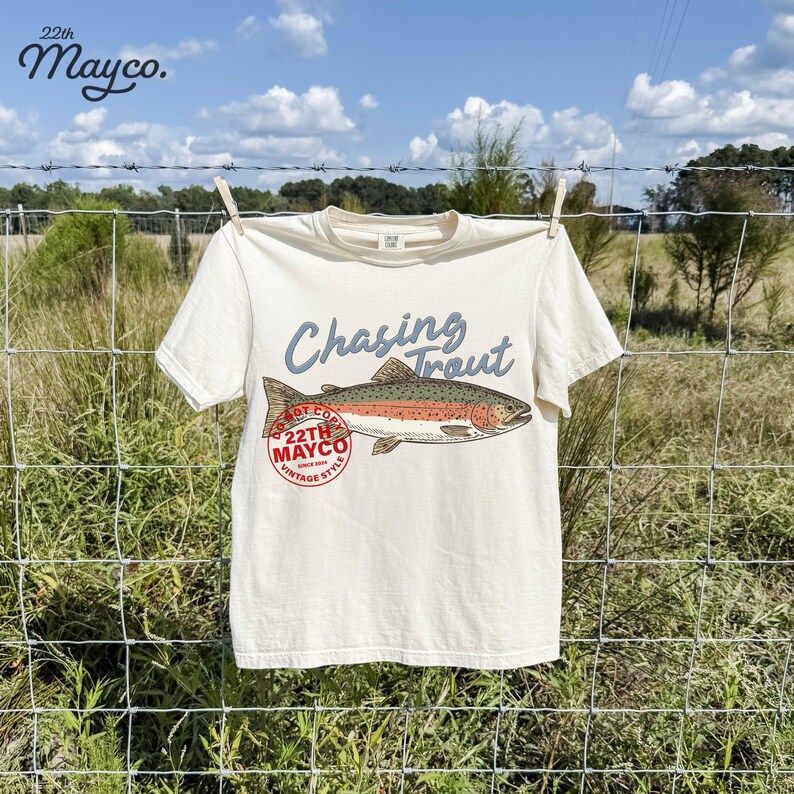 fathers day fishing gift png, unique fisherman gift design idea, rainbow trout graphic for husband shirt, fly fishing buddy art, masculine summer apparel design resource, fishing trip design element, man cave wall decoration trout, retirement gift for fisherman, unique mens apparel fish graphic, cool dad wildlife tee design, husband fishing trip shirt png, thoughtful gift for nature lover, father and son fishing art, outdoorsy gift for him, mountain man lifestyle art, wilderness explorer