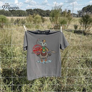gift for duck hunter png, unique cowboy gift design, mallard duck graphic for husband shirt, duck hunting buddy art, masculine summer apparel design resource, man cave wall decoration ducks, retirement gift for outdoorsman, unique mens apparel duck graphic, cool dad wildlife tee design, husband duck hunt trip shirt png, thoughtful gift for nature lover, father and son duck hunting art, western humor clothing design, duck legacy gift, waterfowl enthusiast gift art resource, lake lover gift