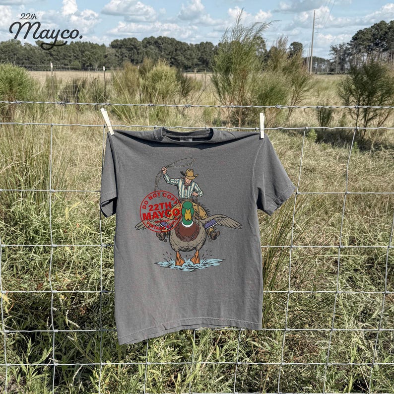 gift for duck hunter png, unique cowboy gift design, mallard duck graphic for husband shirt, duck hunting buddy art, masculine summer apparel design resource, man cave wall decoration ducks, retirement gift for outdoorsman, unique mens apparel duck graphic, cool dad wildlife tee design, husband duck hunt trip shirt png, thoughtful gift for nature lover, father and son duck hunting art, western humor clothing design, duck legacy gift, waterfowl enthusiast gift art resource, lake lover gift
