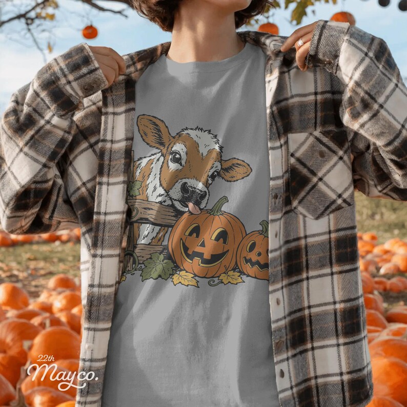hereford cattle lover gift png, halloween cow shirt design, farmer fall digital download, gift for cow moms ranchers and cattle lovers, pumpkin cow sublimation png, farm animal autumn apparel, spooky season calf printable file, country halloween gift for women and men, rustic farmhouse design, cattle breeder seasonal gift, instant download cow png, pumpkin patch farm design, fall cow lover gift, vintage farm animal png