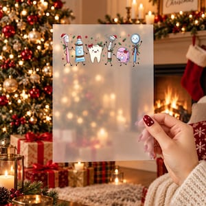 May include: A translucent sheet featuring a colorful cartoon illustration of a smiling tooth surrounded by a toothbrush, toothpaste tube, dental drill, dental floss, and a dental mirror, all wearing festive Christmas hats and holly.