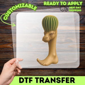 May include: A DTF transfer with a bizarre design: a cactus head on a creature with a horse-like face and a human foot. The transfer is customizable and ready to apply.