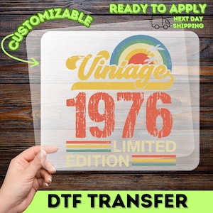 May include: A DTF transfer with a vintage design. The design features the words "Vintage 1976 Limited Edition" in yellow and red, with a rainbow and palm tree graphic. The transfer is ready to apply.