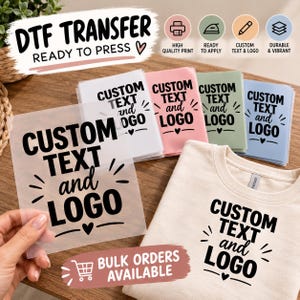 May include: A collection of DTF transfer sheets with the text CUSTOM TEXT and LOGO in black ink. The sheets are available in white, pink, green, and blue. One sheet is held up, and a beige t-shirt features the same black printed design.