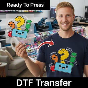 May include: A DTF transfer sheet featuring a cartoon graphic of colorful punctuation marks with faces and text including Comma On, Stop It, What's So Funny, Join Us, and Life's Punny. The same graphic is shown applied to a navy blue t-shirt.