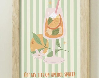 Puede incluir: Una impresión enmarcada con una ilustración de cóctel. La imagen muestra un Aperol Spritz con naranja, hielo y una pajita. El fondo tiene rayas verdes y blancas, y el texto dice "OFF MY TITS ON APEROL SPRITZ."