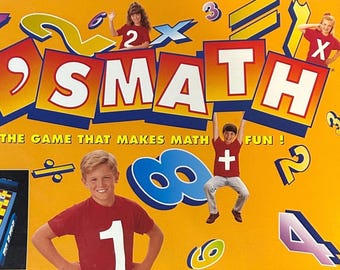 May include: A board game box titled "2 X Math" with children and numbers. The box features the text "The Game That Makes Math Fun!" and includes a game board and instructions. For ages 6 and up.