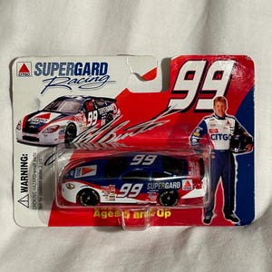 Vintage Die-Cast Car JEFF BURTON #99 Ford Taurus Supergard Racing Series 1/64 scale replica NASCAR Citgo sponsored