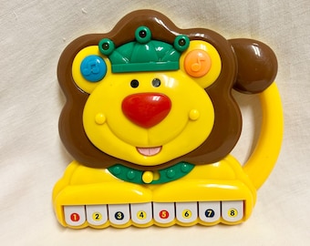 Vintage LION PIANO Megcos ELECTRONIC Toy No. 1289 music and lights Cute baby toddler toy Great Condition It Works 1990&#39;s