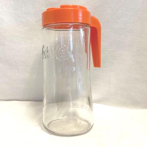 Vintage TANG Glass Pitcher 1 Qt with orange plastic lid and logo 1970&#39;s Great Condition