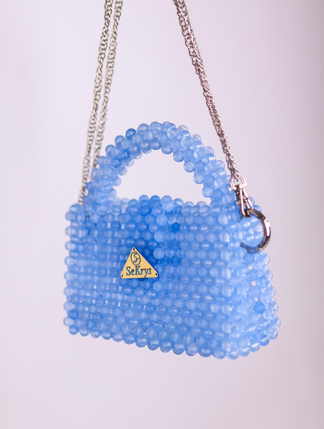 Details Matter Blue Feather Embellished Pearl Strap Clutch Bag