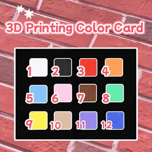 Puede incluir: Una tarjeta de colores de impresi&oacute;n 3D con un fondo negro y doce muestras de colores numeradas. Las muestras incluyen blanco, negro, rojo, naranja, azul, rosa, marr&oacute;n, verde, amarillo, beige, morado y azul oscuro. El texto "3D Printing Color Card" se muestra arriba.