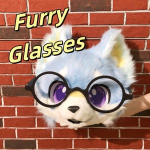 May include: A furry mask with large, round, black-rimmed glasses. The mask is primarily light blue with white and yellow accents, and features large purple eyes. The words "Furry Glasses" are written in yellow above the mask.