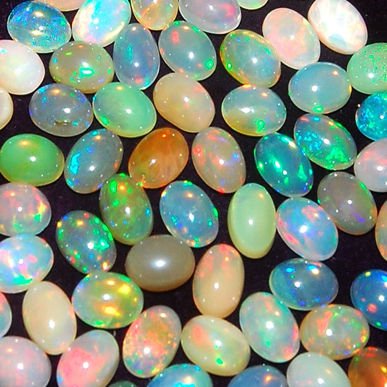 Flashes of Colour 5mm x 3mm Oval Cabochon Gem Gemstone Natural Opal White