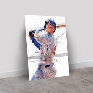 May include: A vertical art print featuring a baseball player in a blue and white uniform with the name CROW-ARMSTRONG and the number 4 on the back. The player wears a blue helmet and swings a bat. The text CLASSIC SPORTS DESIGNS is visible.