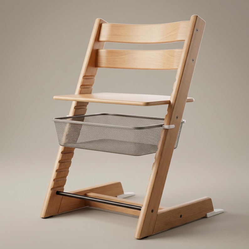 May include: A light-coloured wooden high chair with a grey metal basket and a footrest. The chair has a seat and backrest made of curved wooden slats. The chair is designed for a child.