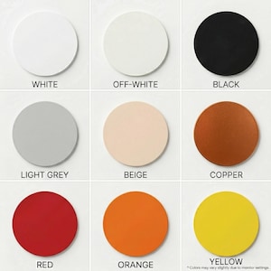 May include: Nine circular colour swatches in white, off-white, black, light grey, beige, copper, red, orange, and yellow. Each swatch has a colour name printed below it. The text at the bottom says "Colours may vary slightly due to monitor settings."