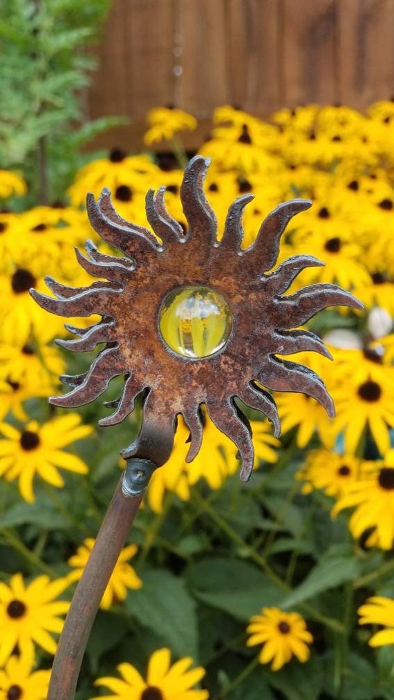 Rusty Sun Garden Stake: Rustic Steel Yard Art with Marble