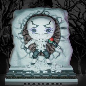 May include: A white figurine of a character with a smiling face and purple accents around the eyes. The figure is holding a red rose and is standing in front of a white stone structure. The word "HANAMI" is displayed at the bottom.